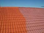 Roof painting with compressed air.